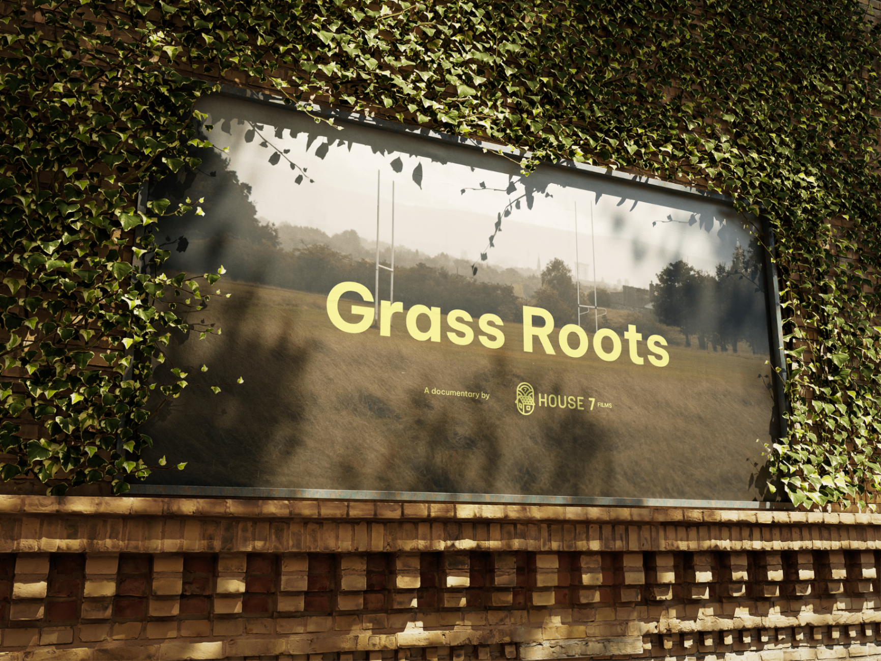 House 7 identity applied at grass-roots scale — billboard-style poster in an ivy-covered street scene